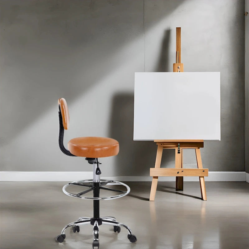In hoogte verstelbare tekenkruk met kunstleren zitting en zwenkwielen