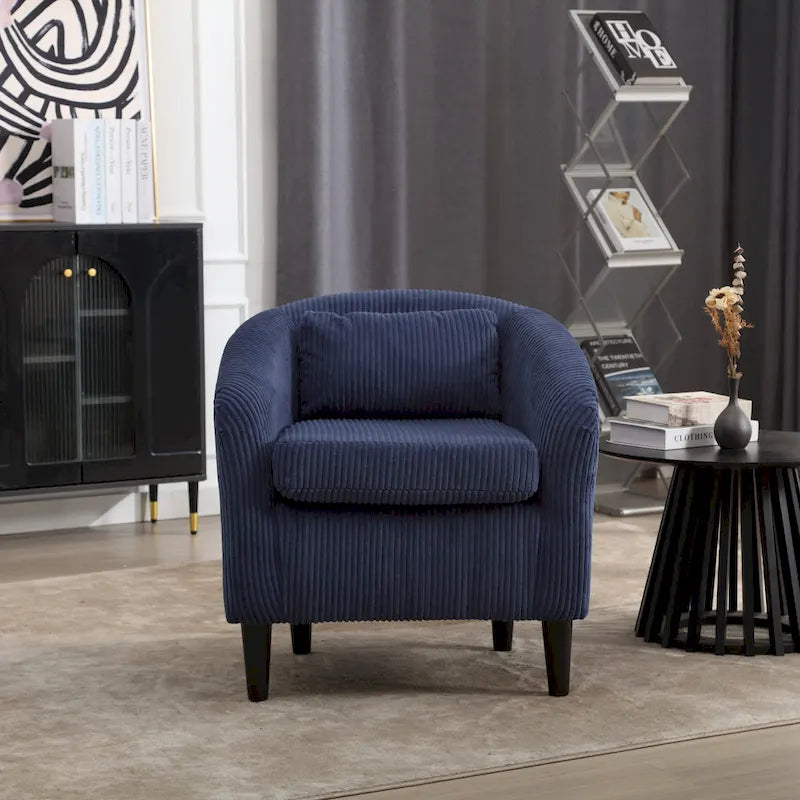 Stoffen fauteuil met kussen en en sierkussen
