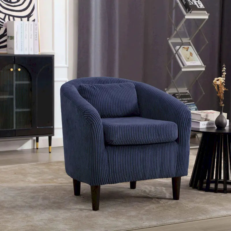 Stoffen fauteuil met kussen en en sierkussen
