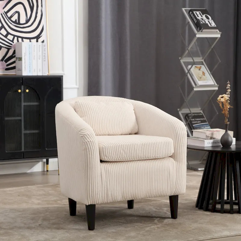 Stoffen fauteuil met kussen en en sierkussen