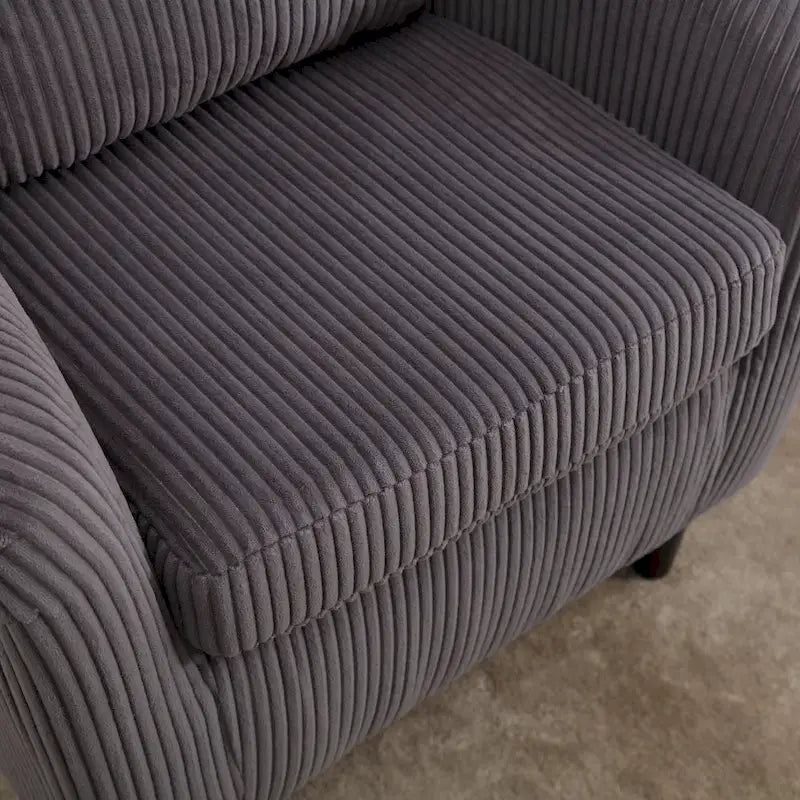 Stoffen fauteuil met kussen en en sierkussen