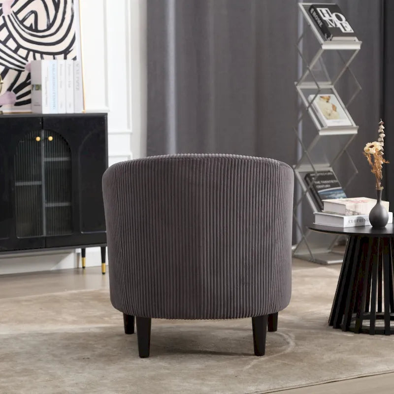 Stoffen fauteuil met kussen en en sierkussen
