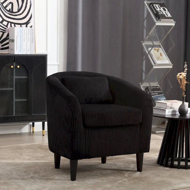 Stoffen fauteuil met kussen en en sierkussen