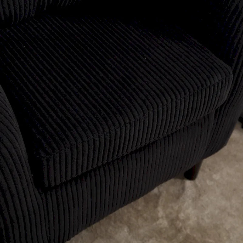 Stoffen fauteuil met kussen en en sierkussen